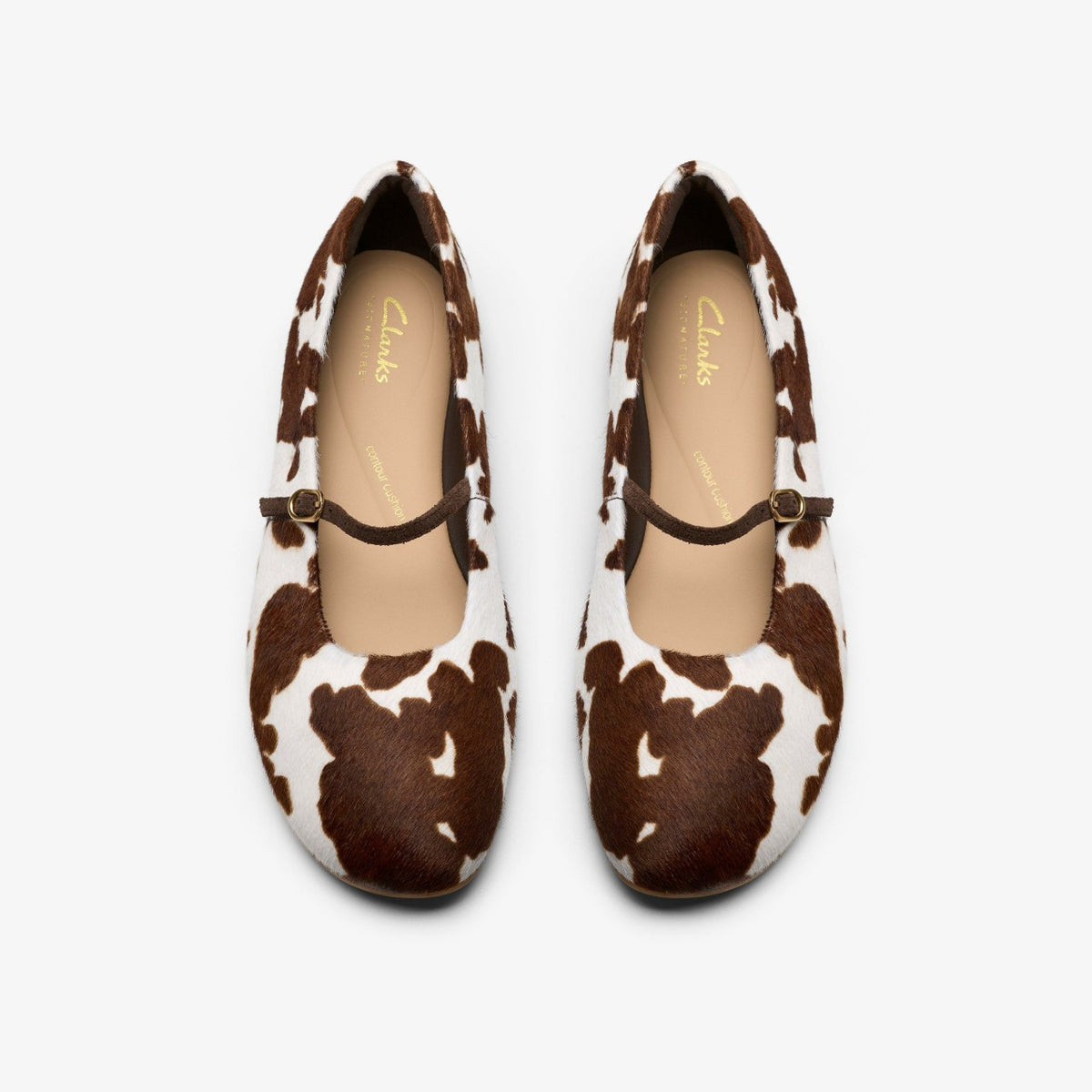 Clarks Deals / Livia Sky Cow Print