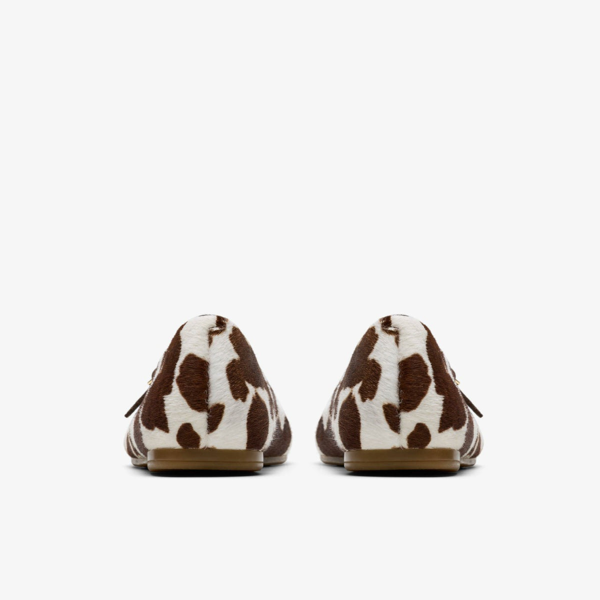 Clarks Deals / Livia Sky Cow Print